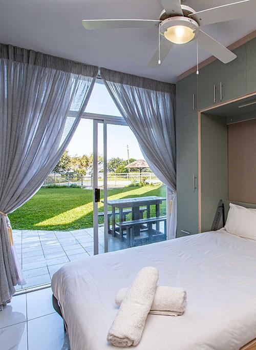 Guest Bedroom with pool view - 23 Umdloti Cabanas